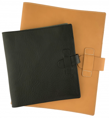 Disc-bound leather notebooks with wrap-around covers, aluminium discs and cream paper